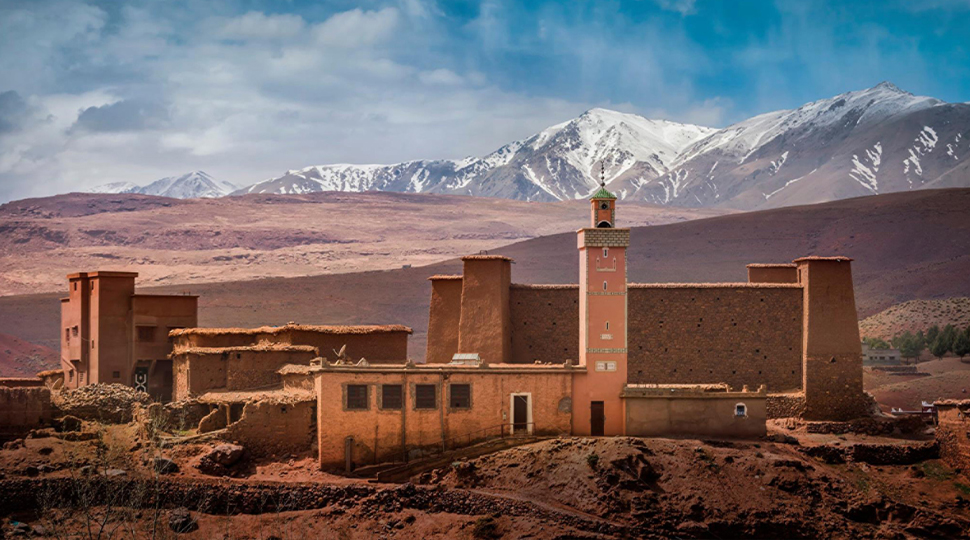 View Over Marrakesh In Morocco, North Africa Towards The Atlas Mountains