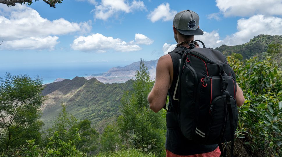 A man overlooking the ocean on a mountain