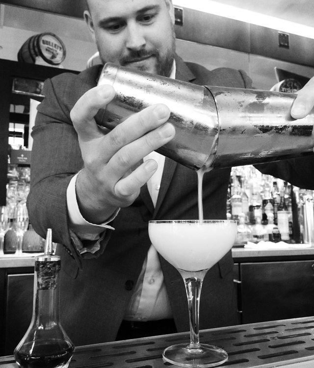 Guy Freshwater makes drinks at the Four Seasons Hotel Palo Alto.
