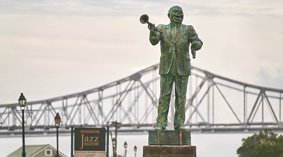 Sculpture in the French Quarter, Crescent City Connection in the background