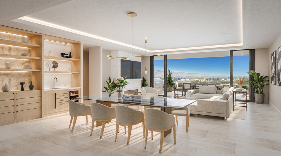 Open-concept living and dining room with white marble floors