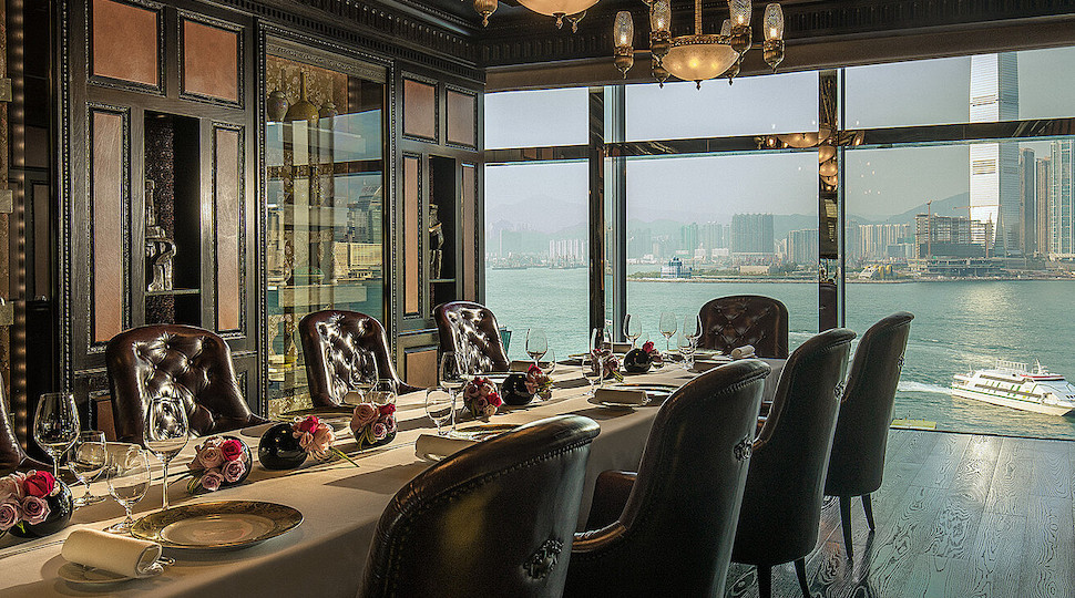 Dining table at Caprice in Hong Kong overlooking the water