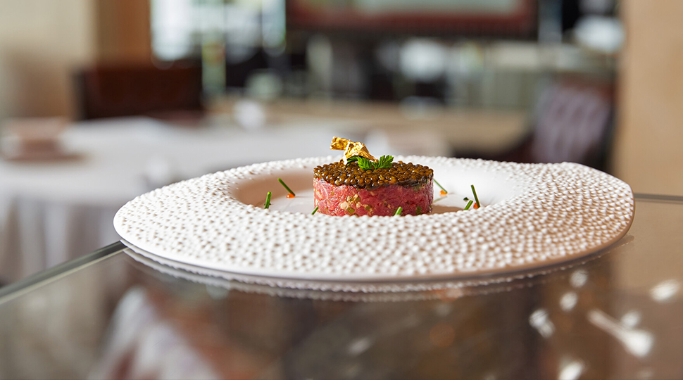 Close up of artfully prepared dish at Caprice in Hong Kong