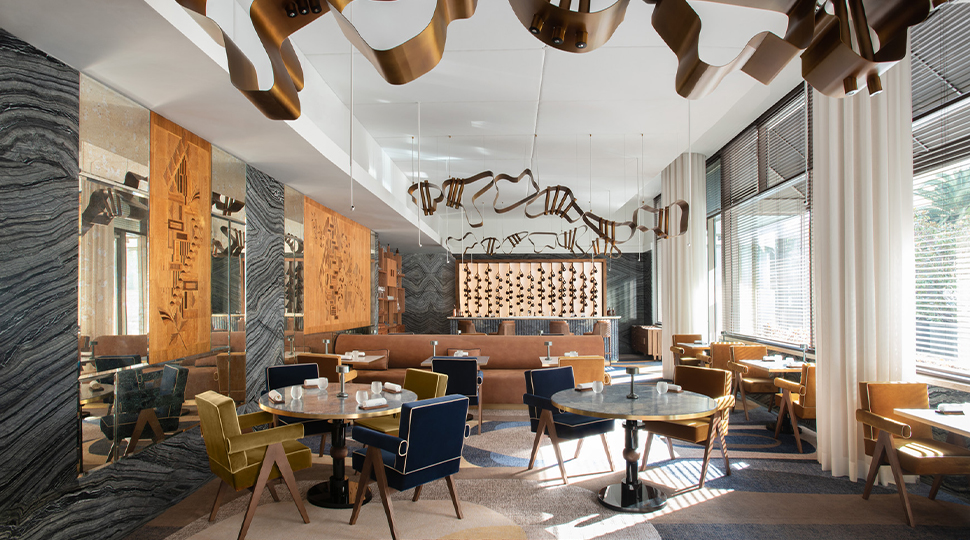 Art-filled interior of CURA dining room at Four Seasons Lisbon