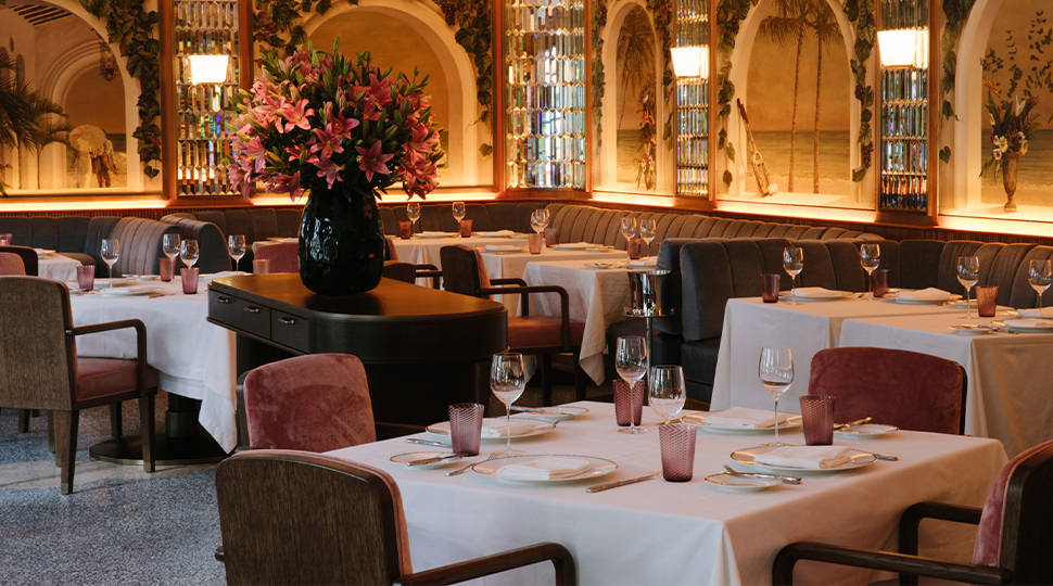 Dimly lit interior of The Surf Club Restaurant dining room