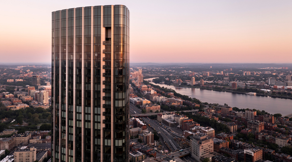 One Dalton, Boston skyscraper rises above the city skyline at dusk
