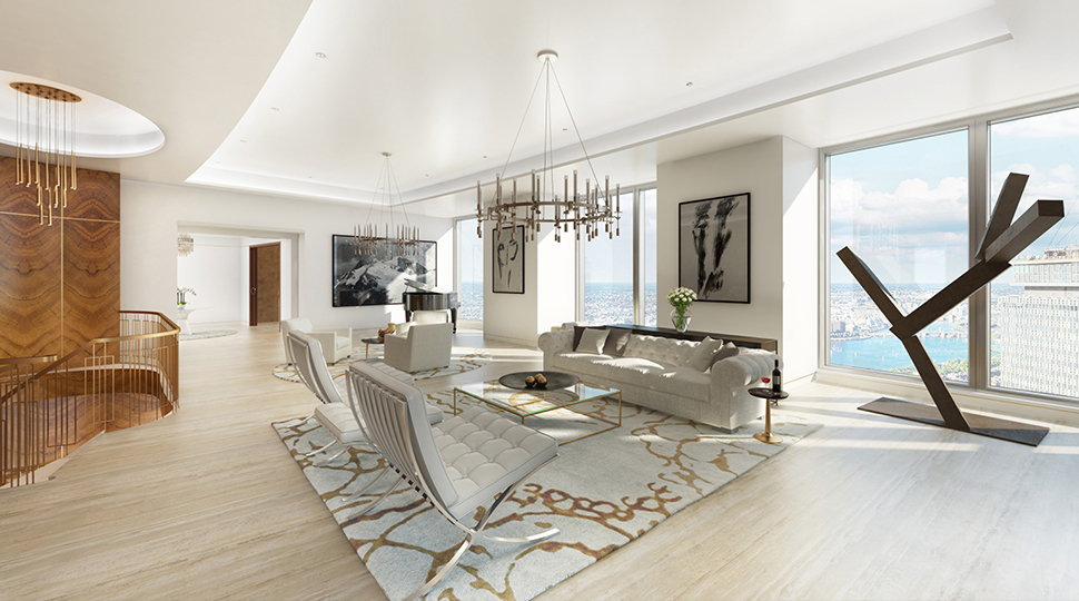 Interior of a residential living room with light-wood floors, light grey furniture, various art works and a row of large windows