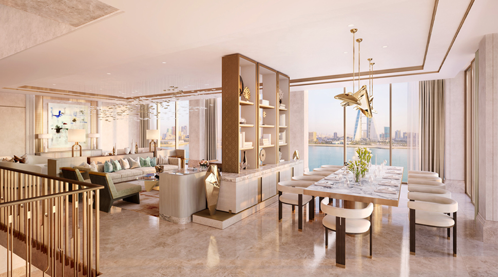 Light and airy living and dining area separated by a wall of shelves with a wall of windows found along both areas