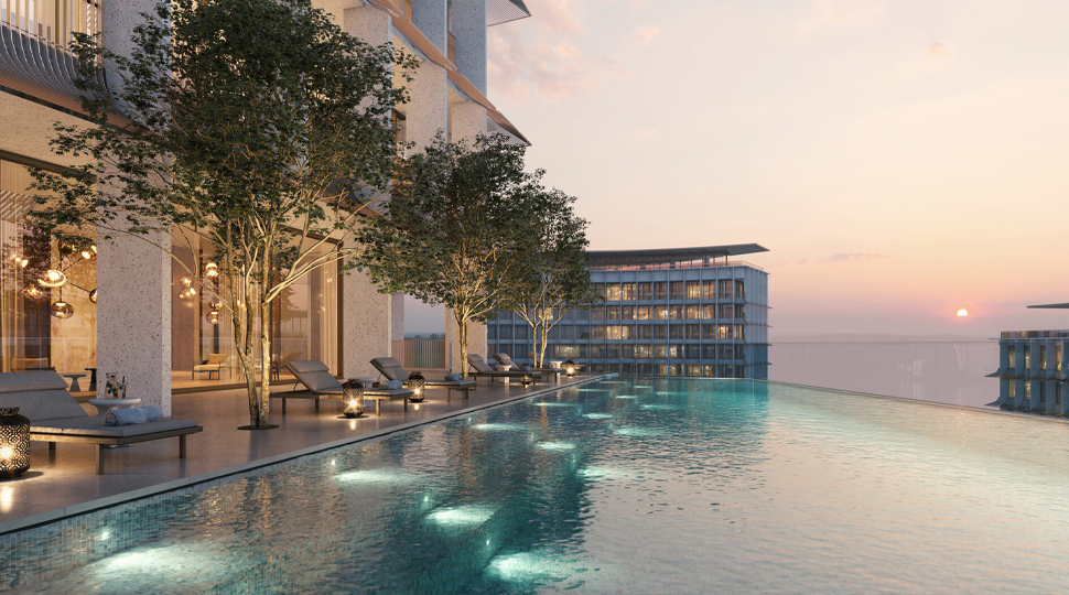 Infinity-edge swimming pool on a rooftop terrace overlooking a city